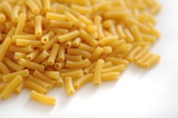 Heap of dried macaroni pasta
