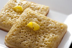 Hot toasted fresh square crumpets