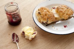 scones with butter and jam on plate