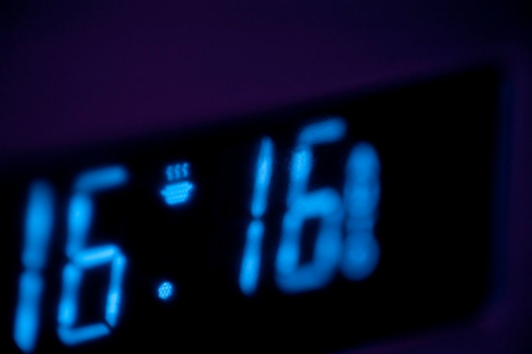 Digital timer display or clock with an illuminated readout on an oven or kitchen appliance