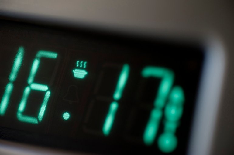 Close up view of the digital readout and display on the timer on an electric oven