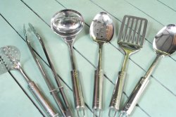 Set of clean stainless steel kitchen utensils
