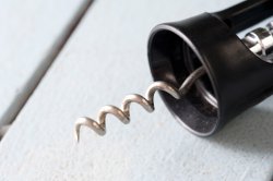 Close up on the sharp metal spiral on a corkscrew