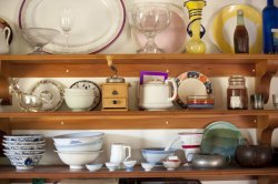 Assorted crockery and glassware on a dresser