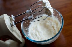 Electric mixer coated in whipped cream
