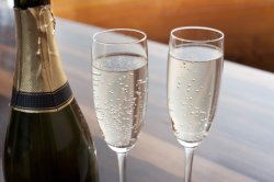 Two elegant flutes of sparkling champagne