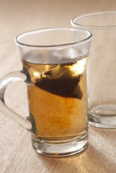 Teabag steeping in boiling water