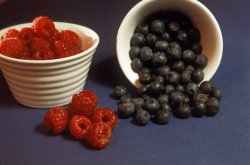 Fresh raspberries and blackcurrants