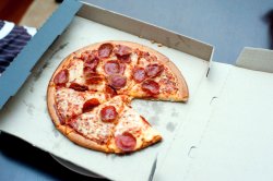 Takeaway pepperoni pizza