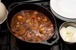 Delicious hot soup in saucepan