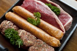 Raw sausages, joints of beefsteak and meat rissoles