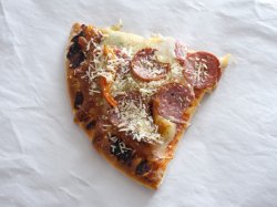 Single slice of pepperoni pizza