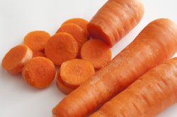 Pile of carrots on white background