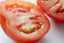 Fresh halved ripe tomato
