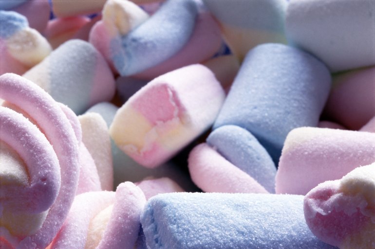 Close-up of tasty colorful marshmallows in hues of pink and blue