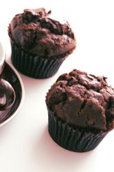 Two freshly baked chocolate muffins