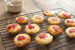 Coconut drops with strawberry jam in the middle