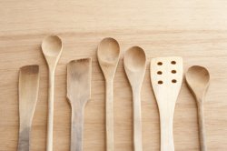 Set of plain wooden kitchen cooking utensils