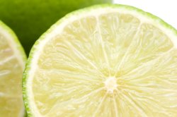 Fresh and green lemon lime halves
