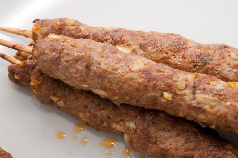 Kofta kebabs made from minced lamb seasoned with spices and herbs which are then skewered and roasted or grilled