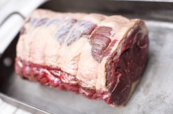 Whole raw trussed beef joint for roasting