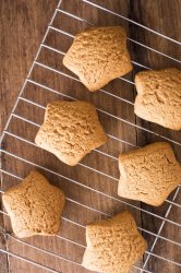 Batch of homemade gingerbread star cookies
