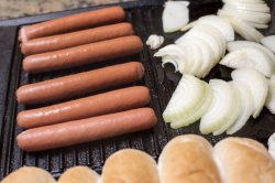 hot dogs on a griddle