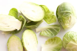 Close up of brussel sprouts on white background